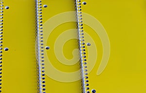 Three Yellow Spiral Notebooks