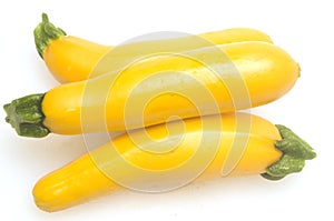 Three yellow zucchini squash