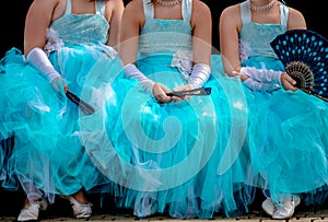 Three young ballerinas in turquise tutu dresses