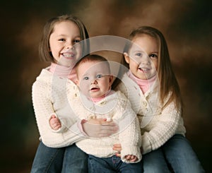 Three young beautiful sisters