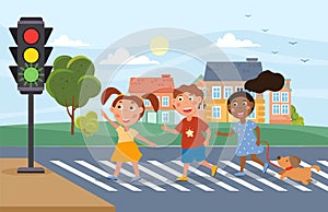 Three young children crossing at a traffic light