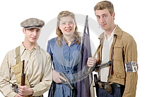 three young French Resistance, vintage clothes and weapons, reenactment