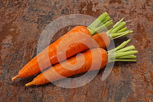 Three Young fresh ripe carrot