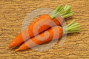 Three Young fresh ripe carrot