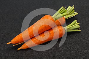 Three Young fresh ripe carrot