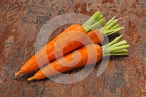 Three Young fresh ripe carrot