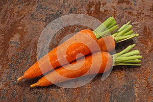 Three Young fresh ripe carrot