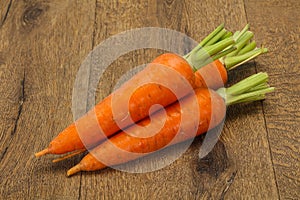 Three Young fresh ripe carrot