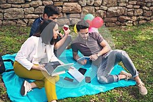 Three young friends on picnic