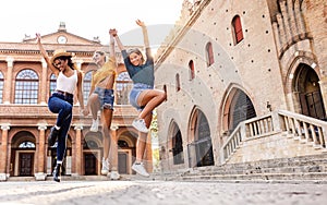 Three young happy women enjoying summer holidays