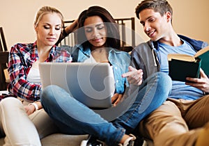 Three young students preparing for exams