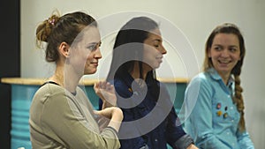 Three young women at the psychological training