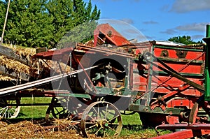 Thresher and Wagon of Shocks in Harvest Mode