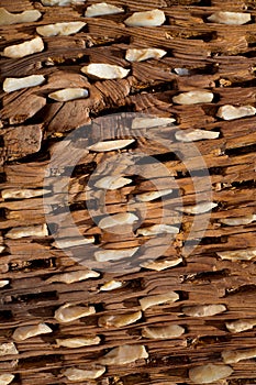 Threshing board of aged wood and stones texture