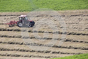 Threshing machine on a field