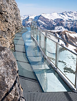 Thrill Walk at Birg in the Swiss Alps, walkway is built into the cliff face. Beneath the steel structure is a vertical drop. 