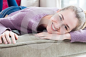 Thrilled beautiful caucasian girl leaning her head for home happiness photo