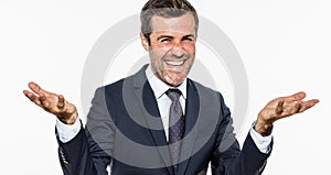 Thrilled elegant businessman laughing and smiling showing openness and success