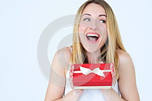 Thrilled excited woman gift box surprise present