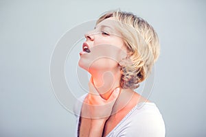 Throat Pain. Closeup Of Sick Woman With Sore Throat Feeling Bad, Suffering From Painful Swallowing. Beautiful Girl Touching Neck