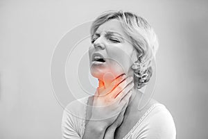 Throat Pain. Closeup Of Sick Woman With Sore Throat Feeling Bad, Suffering From Painful Swallowing. Beautiful Girl Touching Neck