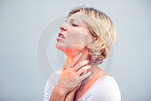 Throat Pain. Closeup Of Sick Woman With Sore Throat Feeling Bad, Suffering From Painful Swallowing. Beautiful Girl Touching Neck