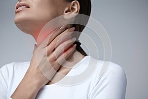 Throat Pain. Closeup Woman With Sore Throat, Painful Feeling photo