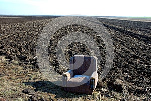 The Throne of the World-Discarded armchair photo