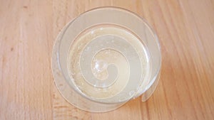 Throw the effervescent tablet into the water. Preparation of a soluble drink to replenish healthy substances