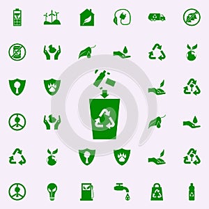 throwing garbage into the trash can green icon. greenpeace icons universal set for web and mobile