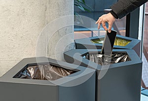 Throwing Out Smartphone, Put Electronic Device Into Trash Can, Throwed Away Smartphone