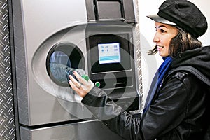 Throwing plastic and glass bottles in recycle automat terminal