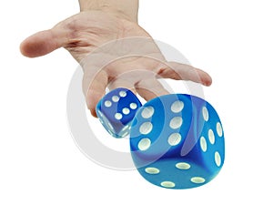 Throwing or rolling dice closeup isolated