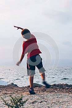 Throwing stones in water