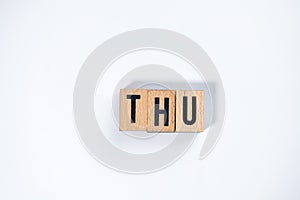 ` THU ` text made of wooden cube on  White background