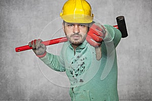 Thumb down and unhappy worker`s face photo