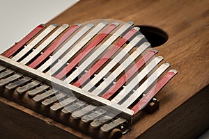 Thumb piano Kalimba, Mbira with silver and red tines