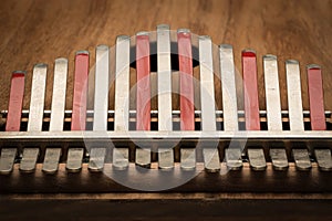 Thumb piano Kalimba, Mbira with silver and red tines