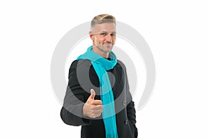 Thumb up for success. handsome male has groomed graying hair. mature guy isolated on white background. autumn casual