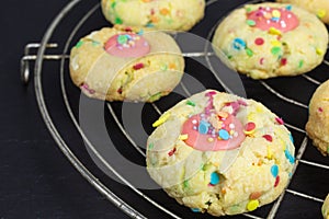 Thumbprint cookies with sugar sprinkles