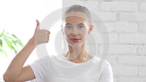 Thumbs Up by Beautiful Woman, Portrait photo