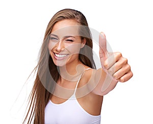 Thumbs up, excited and portrait of a woman with achievement isolated on a studio background. Success, smile and model