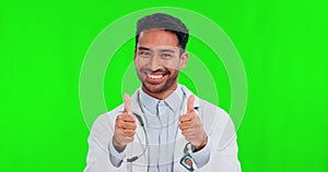 Thumbs up, green screen and man doctor with thank you sign pointing isolated in a studio background and happy. Agreement