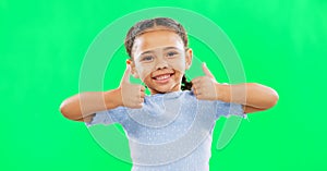 Thumbs up, happy and child in agreement excited, winning and girl kid isolated in studio green screen background. Yes