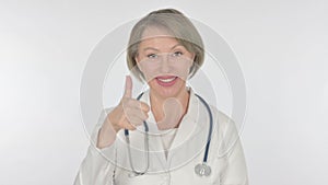 Thumbs Up by Old Female Doctor on White Background