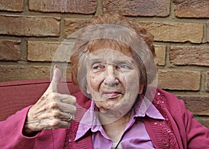 Thumbs up pensioner