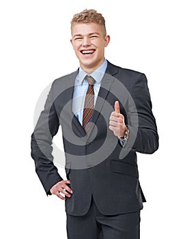 Thumbs up, portrait and business man laugh in studio for success, winning deal and yes sign on white background. Support