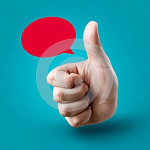 Thumbs up with red speech bubble on blue background.