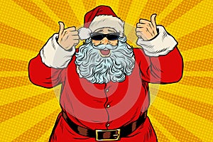 Thumbs up Santa Claus in sunglasses