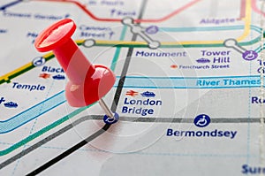 Thumbtack on London Bridge station in london underground map